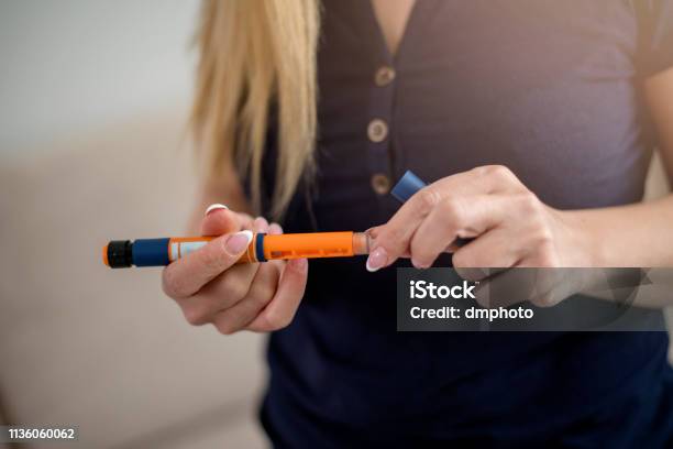 Injection With Insulin Pen Stock Photo - Download Image Now - Insulin, Injection Pen, Pen