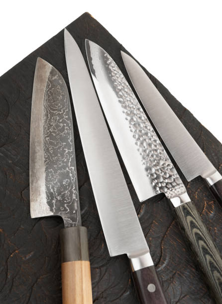 istock Four different knives on wooden board 1136060755