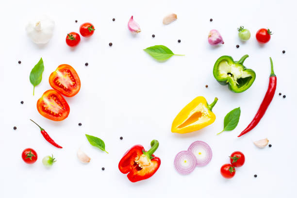 istock Various fresh vegetables and herbs on white background. Healthy eating concept 1136063449