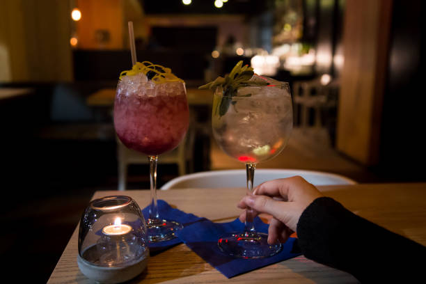 istock Two craft cocktail drink in a upscale cocktail lounge. 1136066726