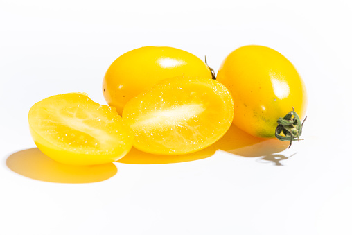 Yellow Tomatoes and White Background