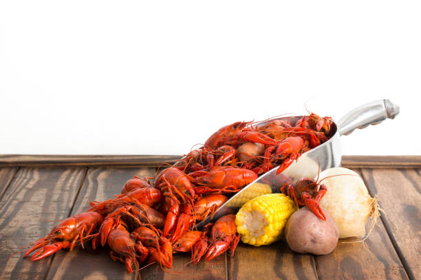 istock Boiled Crawfish on a Wood Background 1136068473