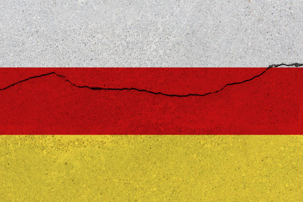 istock south ossetia flag on concrete wall with crack 1136070722