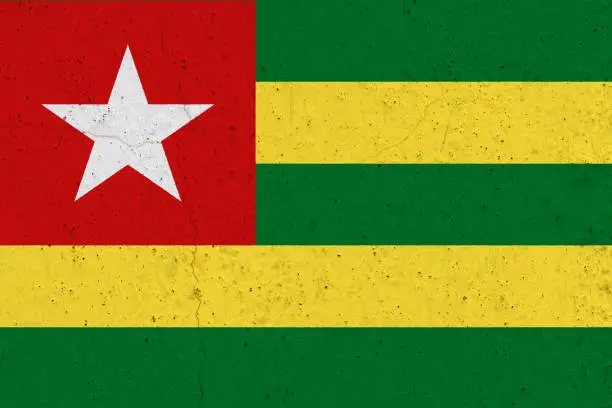 Photo of Togo flag on concrete wall