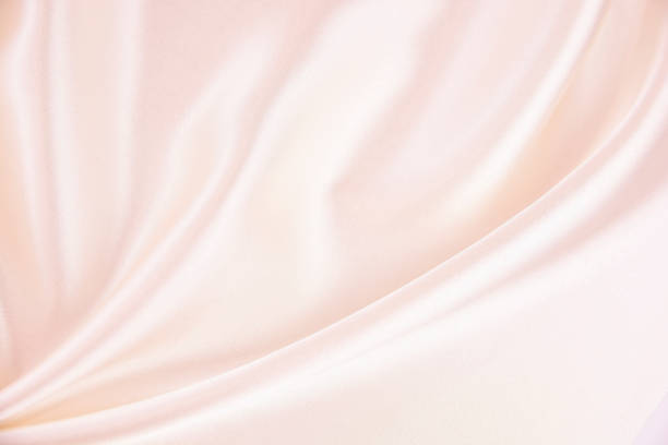 texture satin fabric pink color for the background - satin imagens e fotografias de stock