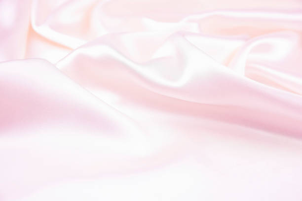 istock Texture satin fabric pink color for the background 1136079002