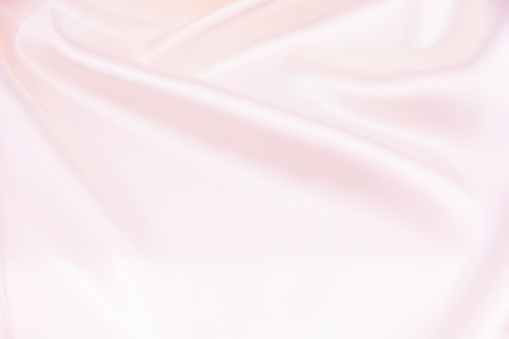Texture satin fabric pink color for the background