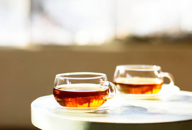 istock Two glass cups of tea 1136079654