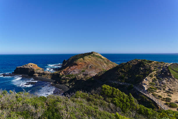 istock Peaceful sea with rocks on shore 1136080928