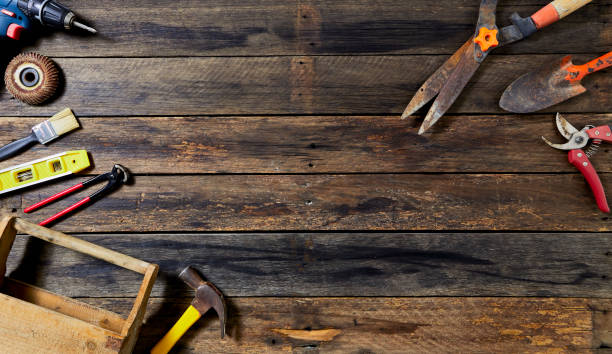 istock 1st MAY Labour Day word many tools on a old wooden background with copy space 1136086364