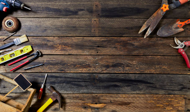 istock 1st MAY Labour Day word many tools on a old wooden background with copy space 1136086365