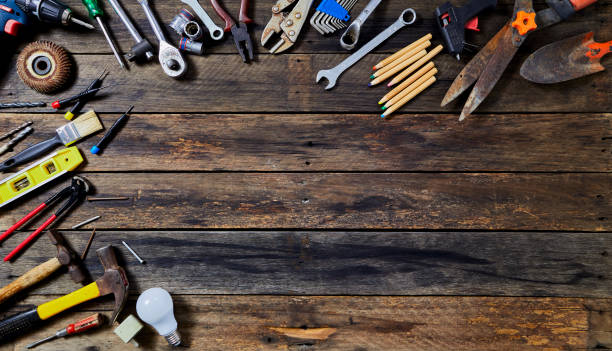 istock 1st MAY Labour Day word many tools on a old wooden background with copy space 1136086383