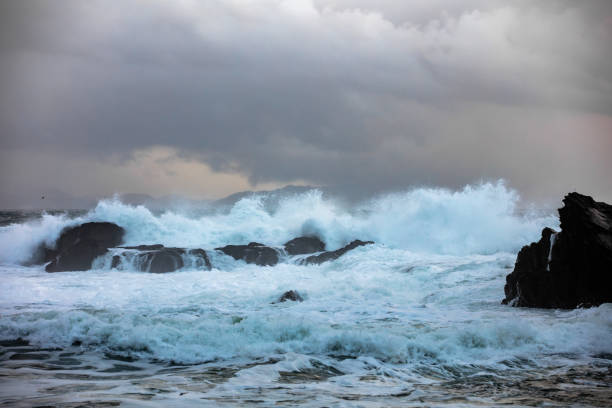 Crashing waves of Atlantic ocean on the rocky on Lofoten islands, Norway