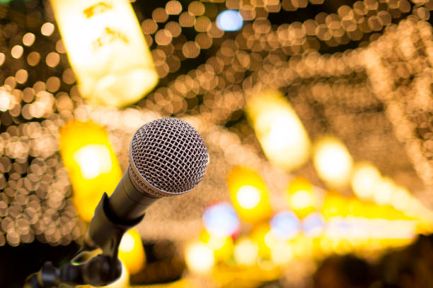 microphone on a background of a blurred yellow background