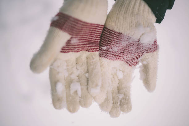 istock Gloves over the snow 1136101514