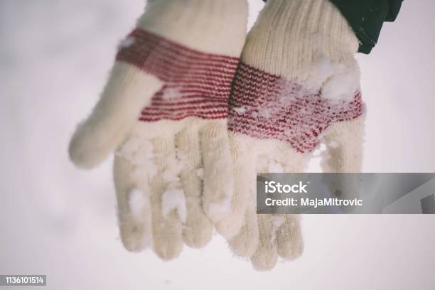 Gloves Over The Snow Stock Photo - Download Image Now - Blue, Close-up, Clothing