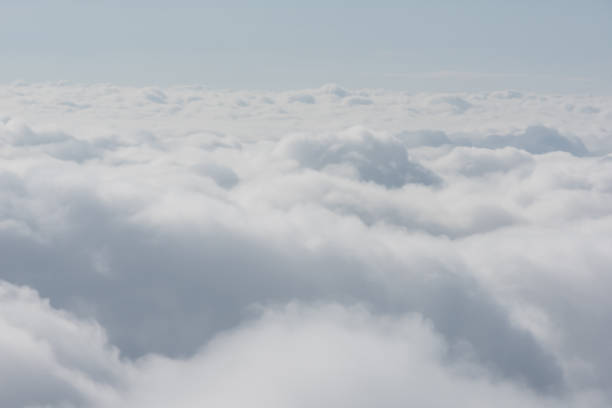 istock cloud and sky view from window of airplane 1136102536