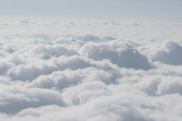 istock cloud and sky view from window of airplane 1136102542