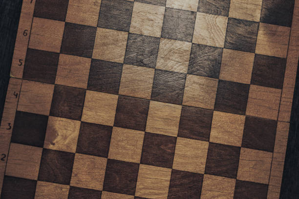 istock Old wooden chess board background. top view. 1136104758