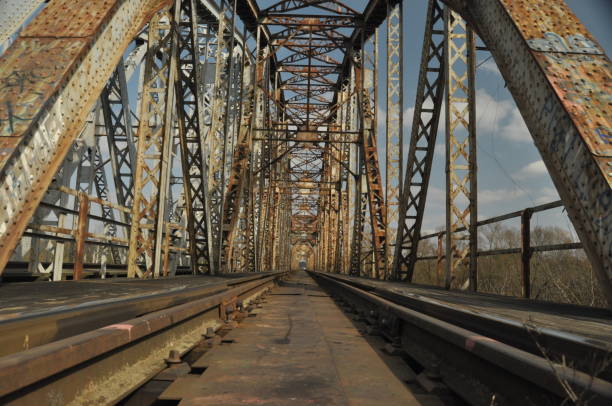 istock Railway bridge. Torah, steel construction. Crossing the river. 1136108723