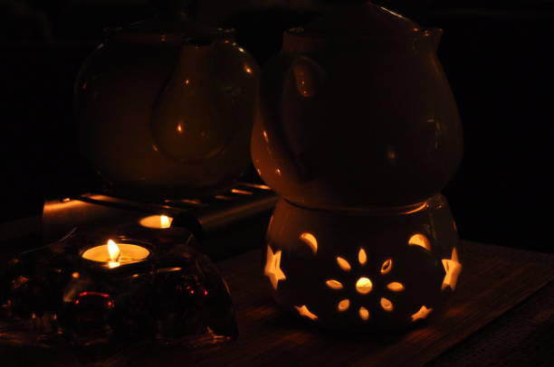 istock Heating tea kettle, teapot standing over the fire. Heated drink. 1136108812