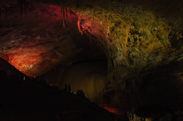 istock Prometheus Cave. Georgia. Stalactites and stalagmites highlighted colors. 1136109221