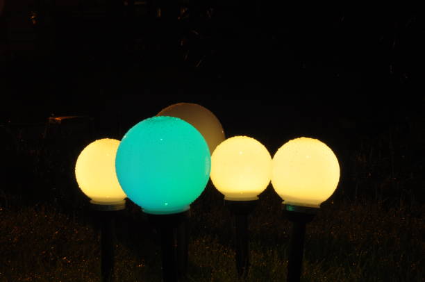 istock Lanterns lit in the garden. Night and the glowing balls 1136109921
