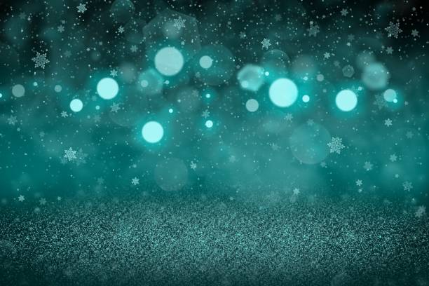 istock light blue wonderful sparkling glitter lights defocused bokeh abstract background with falling snow flakes fly, festival mockup texture with blank space for your content 1136109936