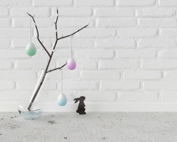 istock Easter handmade home decoration, vase with willow branches, hanging Easter eggs and easter bunny figurines, 3d rendering. 1136113904