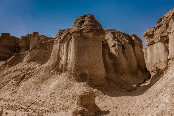istock Sandstone formations around Al Khobar Caves (Jebel Qarah), Al Hofuf, Saudi Arabia 1136114483