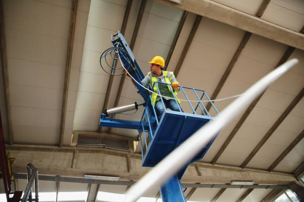 istock Industrial Workers Controling Machine in the Factory 1136116358