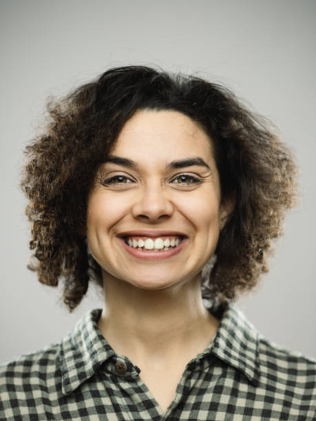 Studio portrait of young happy woman with excited expression stock photo