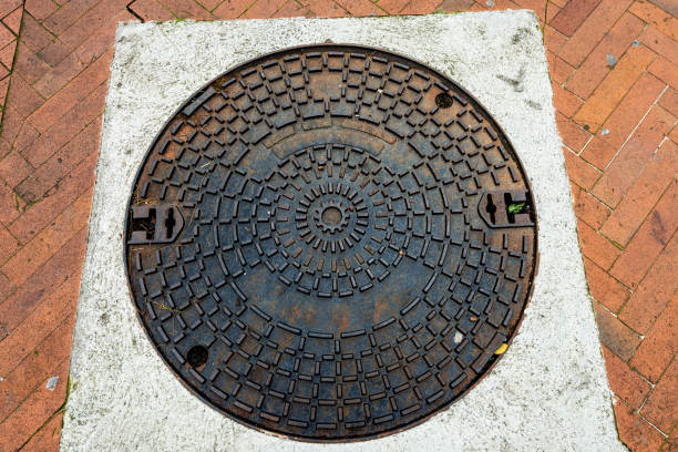 istock Iron rusty manhole cover for sewage - Italy 1136123292