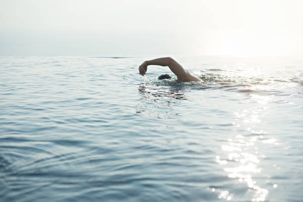 istock A man swimming for exercise in at swimming pool 1136123565