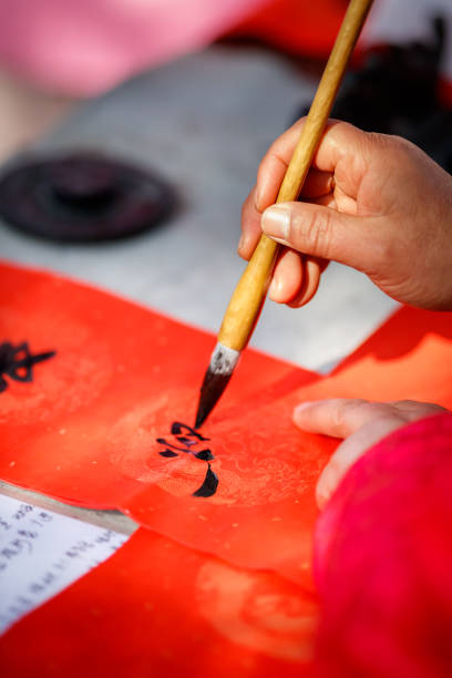 istock Handheld brush painting chinese calligraphy 1136127974