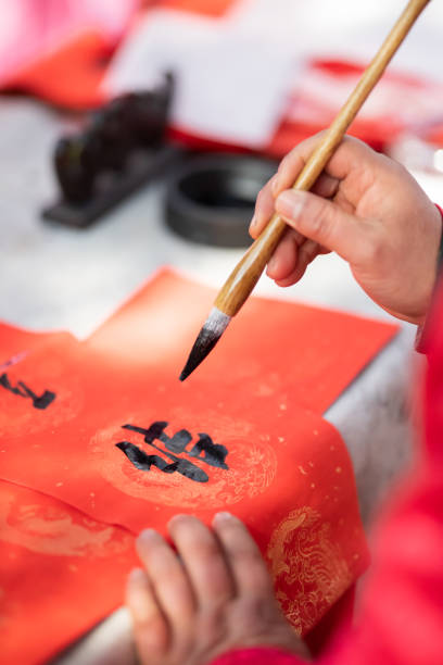 istock Handheld brush painting chinese calligraphy 1136127996