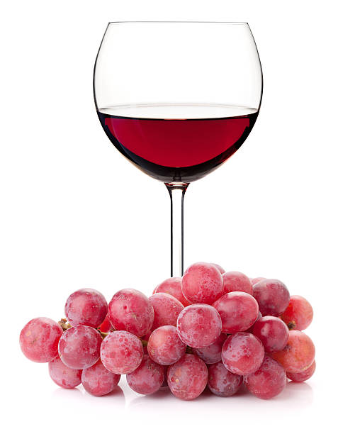 istock Red wine in glass with grape branch 113612896