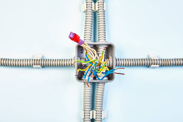 istock Insulating tape and shrinkable tube twisted wires. 1136129358