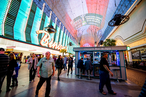 Las Vegas, USA - December 30, 2017: Famous Fremont street full of tourists having fun, shopping and waiting for the show