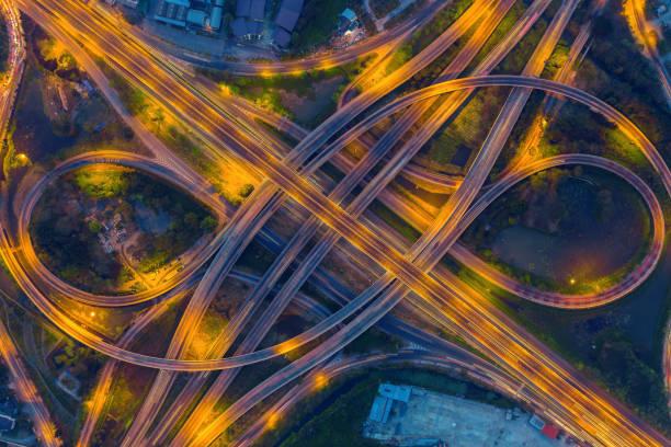 istock Aerial view of busy highway road junctions at night. 1136134507