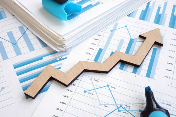 istock Business growth concept. Financial report with graphs and arrow. 1136139397
