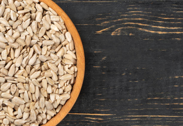 istock Sunflower seeds in bowl 1136139491