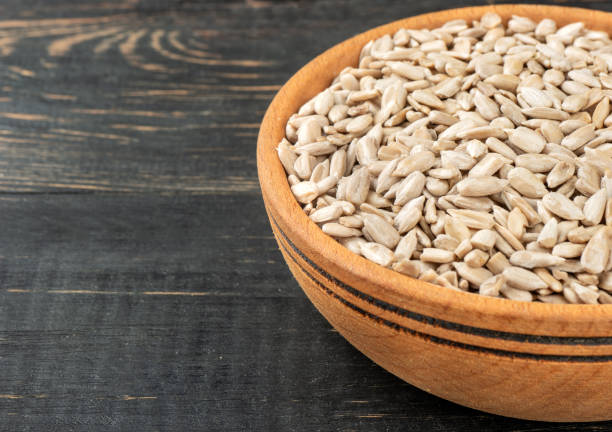 istock Sunflower seeds in bowl 1136139516