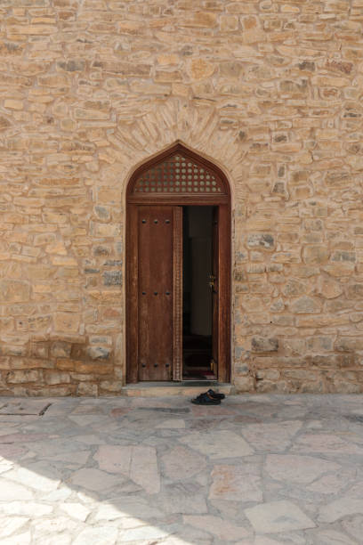 istock Oman ancient door to mosque 1136141414