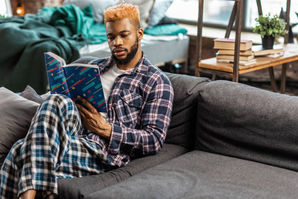 istock Nice African American man holding a book 1136143823
