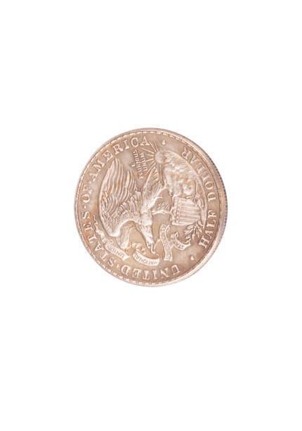 istock half dollar coin isolated on white background 1136143852