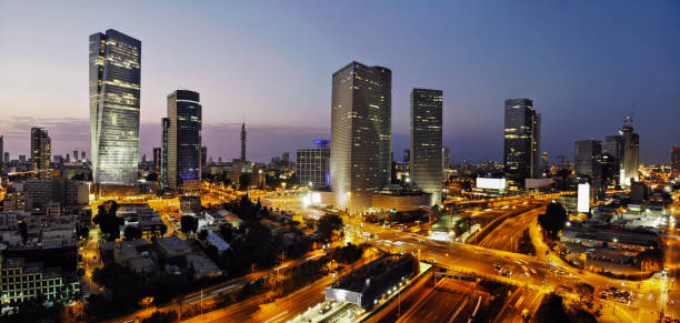 istock Modern office building downtown cityscape skyscraper skyline aerial view night 1136143985