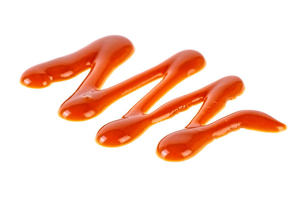 istock Caramel sauce isolated on a white background 1136144122
