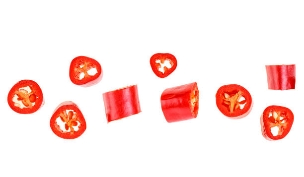 istock Red chopped chili peppers on white background. Top view. 1136144145