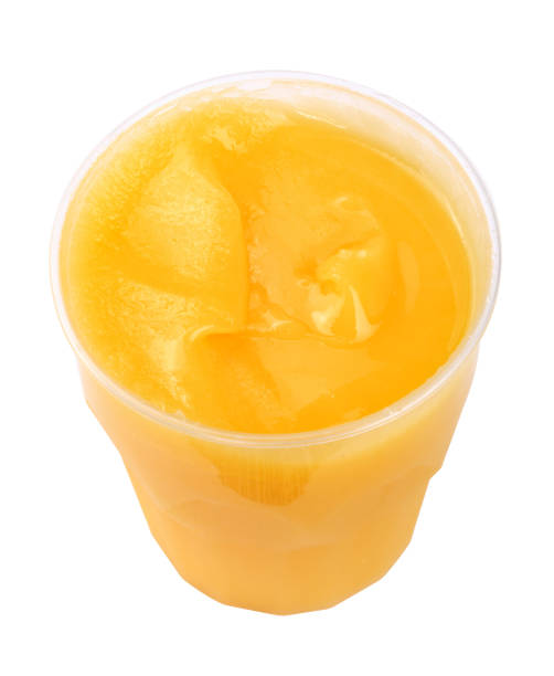 istock yellow honey in plastic figured container isolated on white background at dry sunny day 1136145878